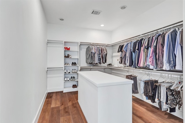 5406 Darling St Unit A, Houston, TX 77007 - walk in closet with dark wood-style flooring