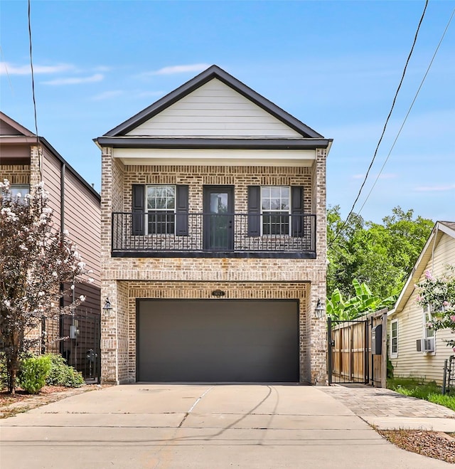 5406 Darling St Unit A, Houston, TX 77007 - view of front of property featuring brick siding, a balcony, driveway, a garage, and cooling unit