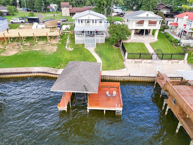 374 W Lake Shore Dr, Livingston, TX 77351 - dock with a fenced backyard, boat lift, and a water view