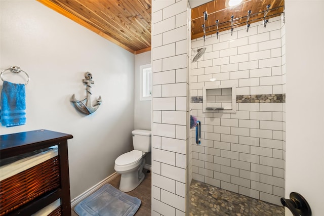374 W Lake Shore Dr, Livingston, TX 77351 - full bathroom with a tile shower, wooden ceiling, and wood finished floors