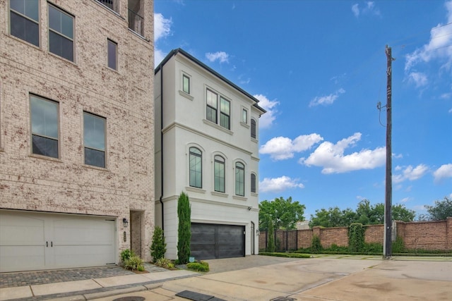 3502 Dorset Cliff Ln, Houston, TX 77055 - view of front of home with a garage, driveway, and brick siding