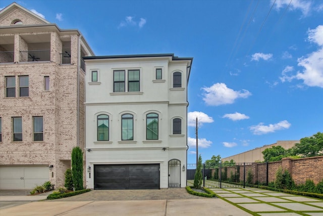 3502 Dorset Cliff Ln, Houston, TX 77055 - view of front of home featuring driveway, a garage, and stucco siding