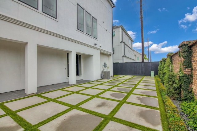 3502 Dorset Cliff Ln, Houston, TX 77055 - fenced backyard with a patio