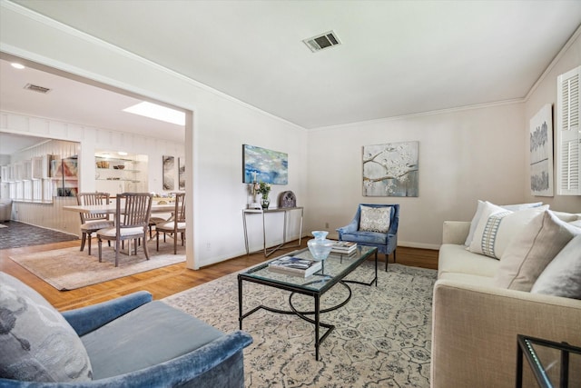 6249 Piping Rock Ln, Houston, TX 77057 - living room with wood finished floors and ornamental molding