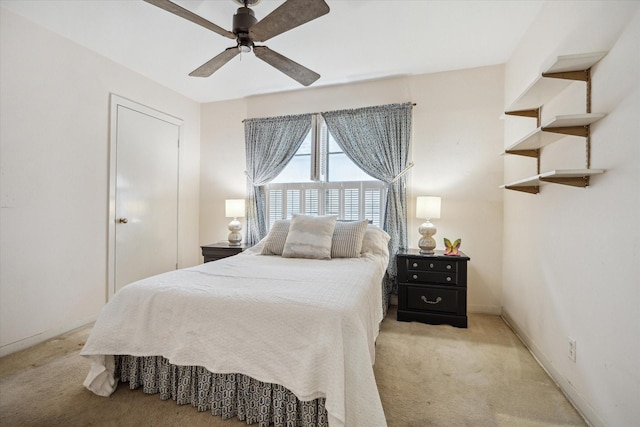 6249 Piping Rock Ln, Houston, TX 77057 - bedroom featuring light carpet and a ceiling fan
