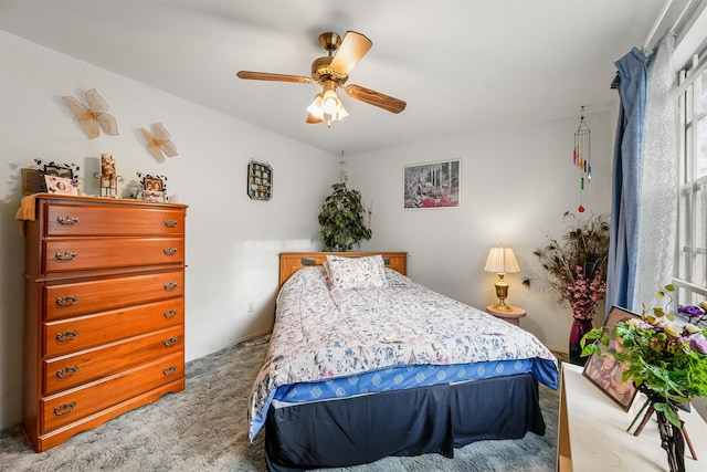 13922 Ambrose St, Houston, TX 77045 - bedroom with light colored carpet and ceiling fan