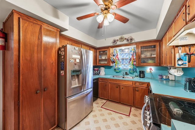 13922 Ambrose St, Houston, TX 77045 - kitchen featuring stainless steel fridge with ice dispenser, brown cabinetry, ceiling fan, range with electric cooktop, and glass insert cabinets