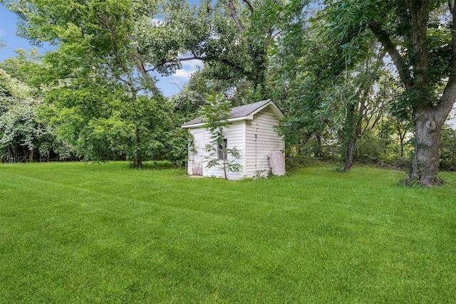 13922 Ambrose St, Houston, TX 77045 - view of green lawn with a storage shed