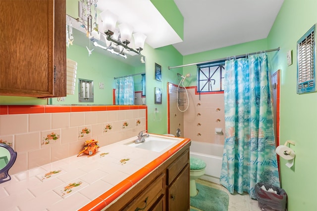 13922 Ambrose St, Houston, TX 77045 - bathroom featuring shower / bath combination with curtain, vanity, and tile patterned floors