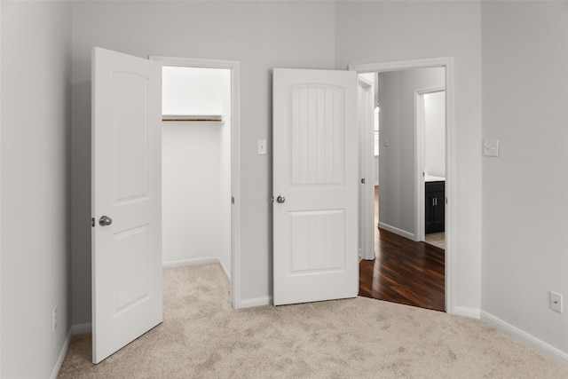 23753 Briar Tree Dr, Porter, TX 77365 - unfurnished bedroom with carpet floors and a spacious closet
