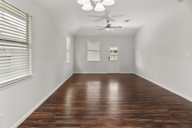 23753 Briar Tree Dr, Porter, TX 77365 - spare room featuring ceiling fan, a chandelier, wood finished floors, and vaulted ceiling