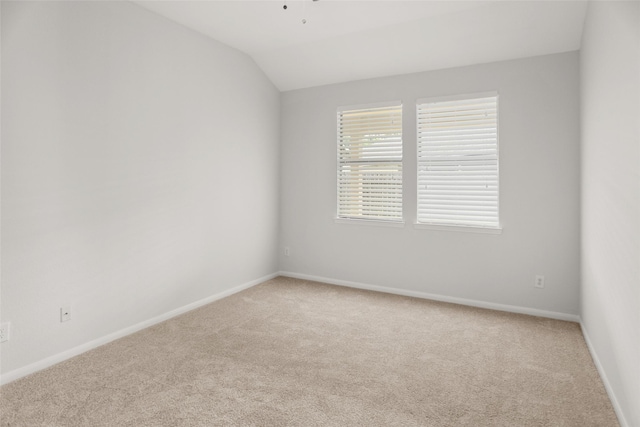 23753 Briar Tree Dr, Porter, TX 77365 - spare room with carpet floors and vaulted ceiling