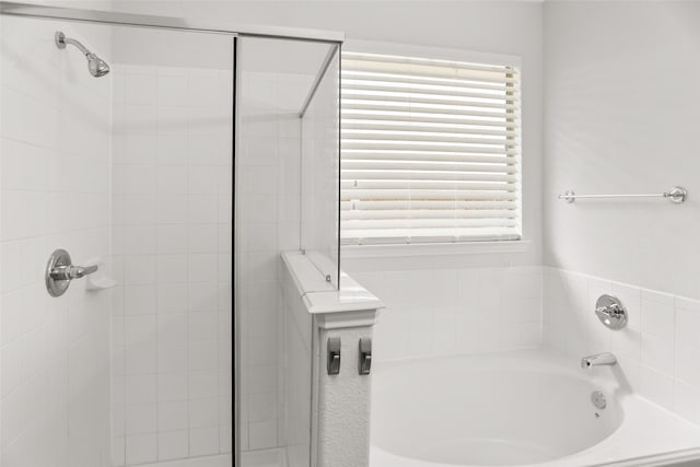 23753 Briar Tree Dr, Porter, TX 77365 - full bath featuring a garden tub and a tile shower