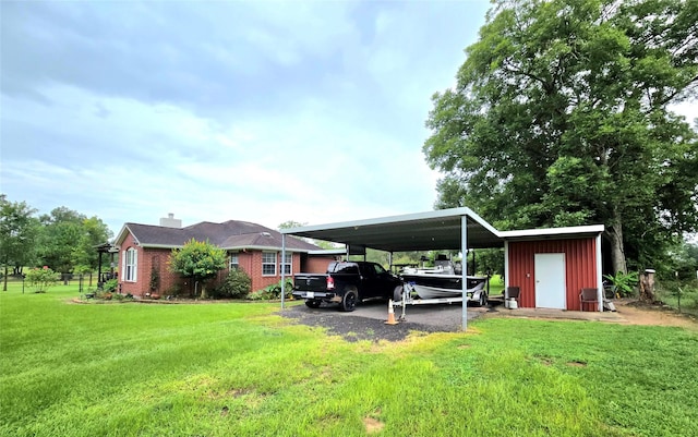 110 Red Bud St, Shepherd, TX 77371 - view of green lawn featuring driveway