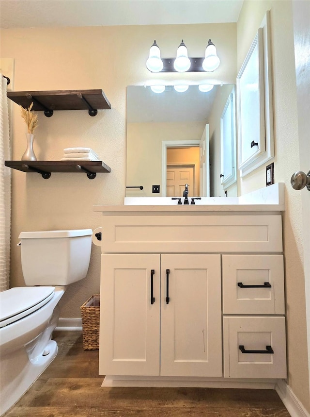 110 Red Bud St, Shepherd, TX 77371 - bathroom with wood finished floors and vanity