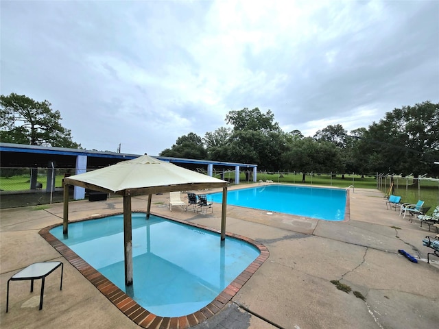 110 Red Bud St, Shepherd, TX 77371 - community pool featuring a patio area