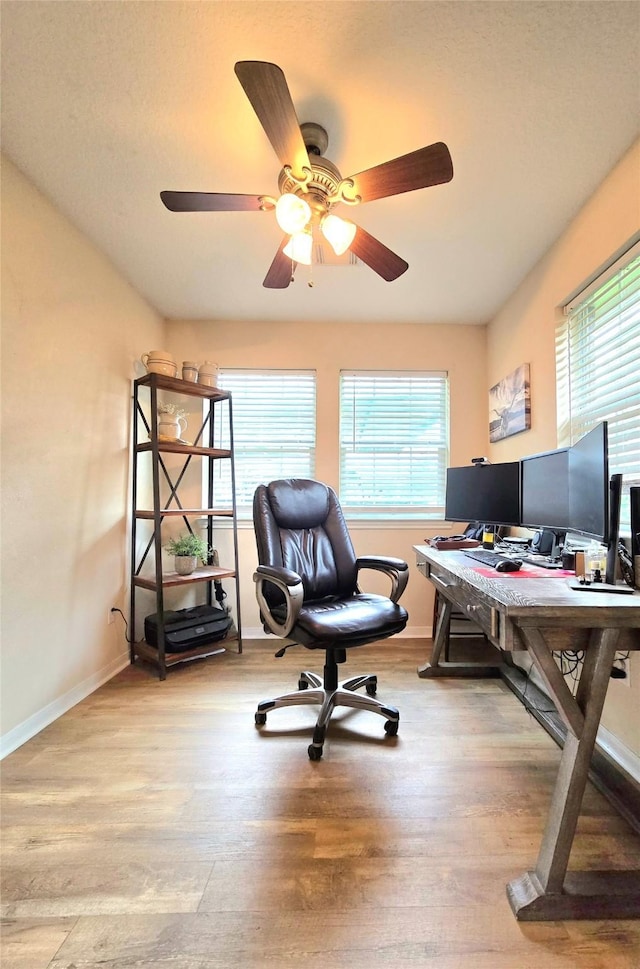 110 Red Bud St, Shepherd, TX 77371 - office space with wood finished floors and a ceiling fan