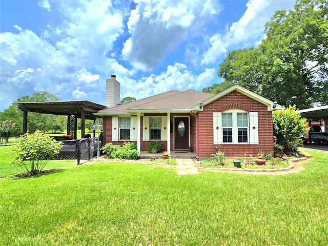 110 Red Bud St, Shepherd, TX 77371 - view of front of house with a chimney, brick siding, a carport, and covered porch