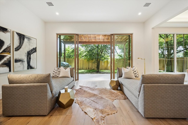 3755 Rice Blvd, Houston, TX 77005 - living room with plenty of natural light, wood finished floors, and recessed lighting