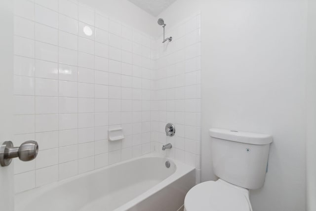4444 Victory Dr Unit 26, Houston, TX 77088 - bathroom featuring toilet and shower / washtub combination