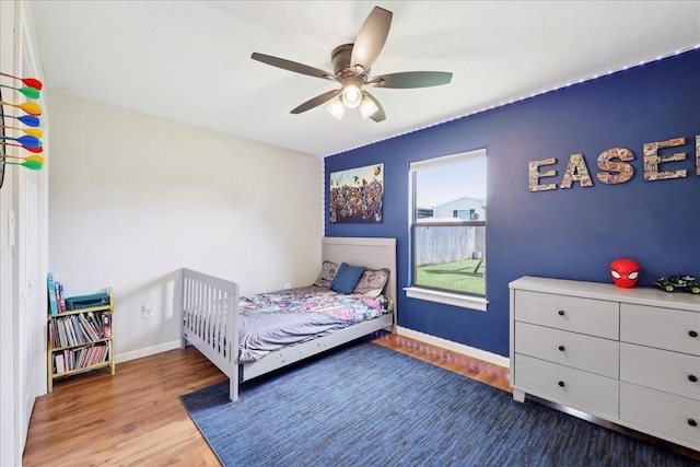 505 Shannons Way, Bridge City, TX 77611 - bedroom featuring wood finished floors and a ceiling fan