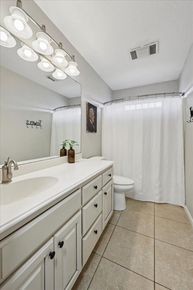 505 Shannons Way, Bridge City, TX 77611 - full bathroom featuring vanity, tile patterned floors, and a shower with shower curtain