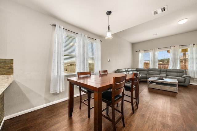 9422 Cimarroncito Ln, Humble, TX 77396 - dining area featuring dark wood finished floors