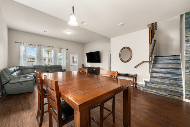 9422 Cimarroncito Ln, Humble, TX 77396 - dining space with wood finished floors and stairway