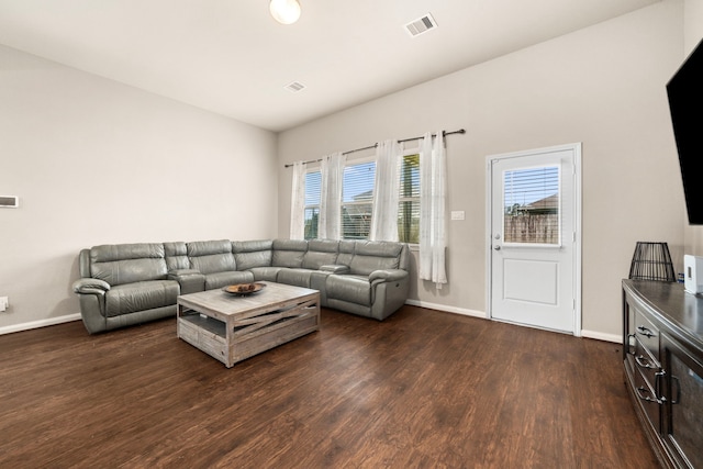 9422 Cimarroncito Ln, Humble, TX 77396 - living area with dark wood-type flooring and baseboards