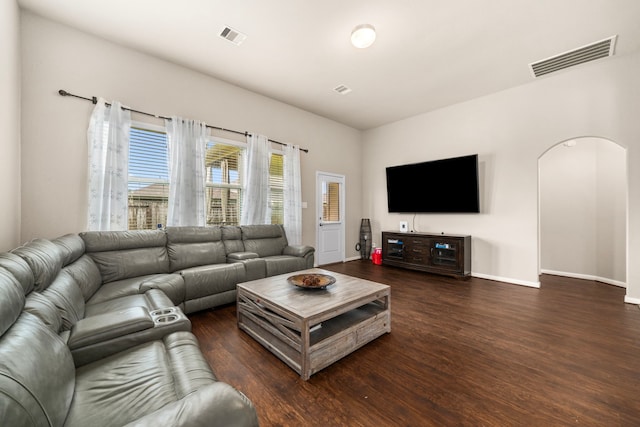 9422 Cimarroncito Ln, Humble, TX 77396 - living room with wood finished floors and arched walkways