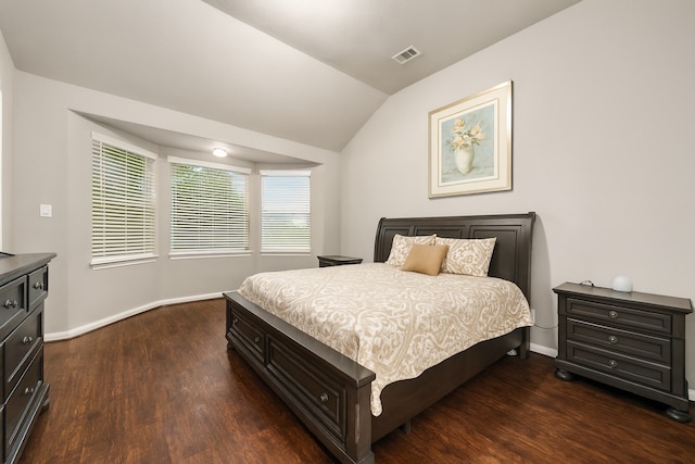 9422 Cimarroncito Ln, Humble, TX 77396 - bedroom with dark wood-type flooring and vaulted ceiling