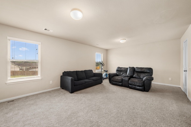 9422 Cimarroncito Ln, Humble, TX 77396 - carpeted living area featuring baseboards