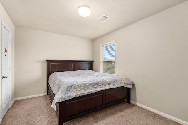 9422 Cimarroncito Ln, Humble, TX 77396 - bedroom with light carpet and baseboards