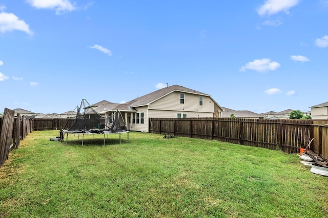9422 Cimarroncito Ln, Humble, TX 77396 - fenced backyard with a trampoline