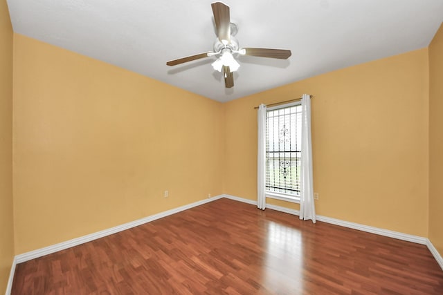 6102 S Briar Bayou Dr, Houston, TX 77072 - empty room with wood finished floors and ceiling fan