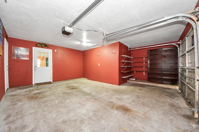 6102 S Briar Bayou Dr, Houston, TX 77072 - garage featuring a garage door opener