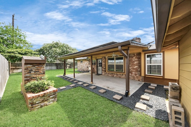 6102 S Briar Bayou Dr, Houston, TX 77072 - fenced backyard featuring a patio and an outdoor structure