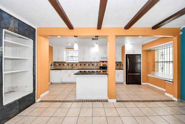 6102 S Briar Bayou Dr, Houston, TX 77072 - kitchen with white appliances, light tile patterned floors, dark countertops, decorative backsplash, and beamed ceiling