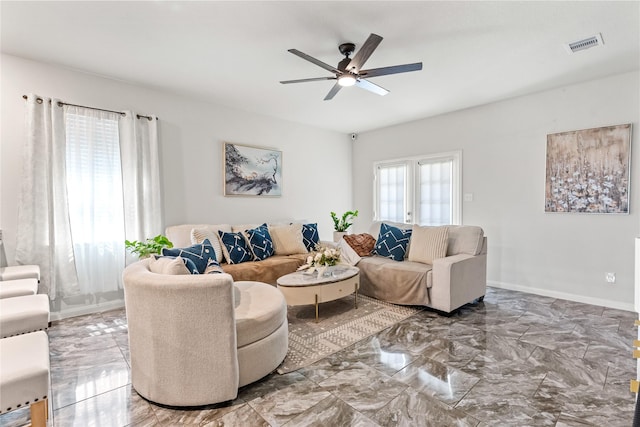 10731 Spring Brook Pass Dr, Humble, TX 77396 - living area with ceiling fan and marble finish flooring