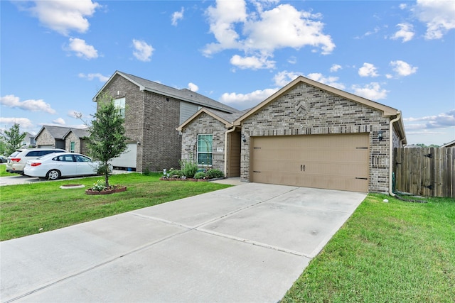 10731 Spring Brook Pass Dr, Humble, TX 77396 - view of front facade with driveway, a garage, and brick siding
