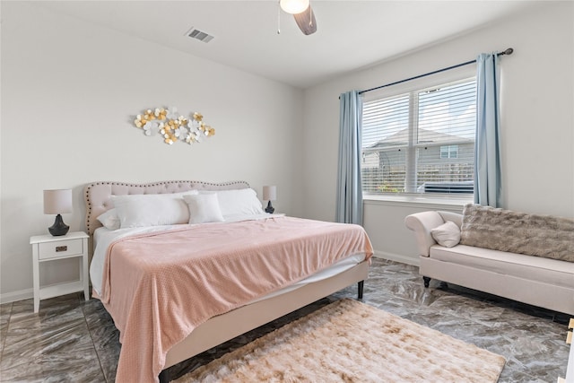 10731 Spring Brook Pass Dr, Humble, TX 77396 - bedroom featuring marble look tile flooring and a ceiling fan