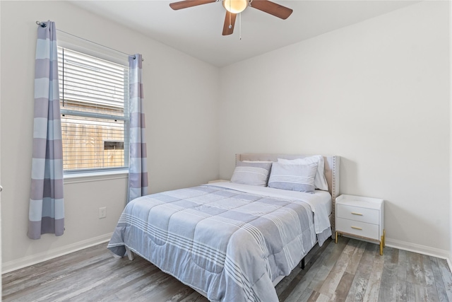 10731 Spring Brook Pass Dr, Humble, TX 77396 - bedroom with wood finished floors and ceiling fan