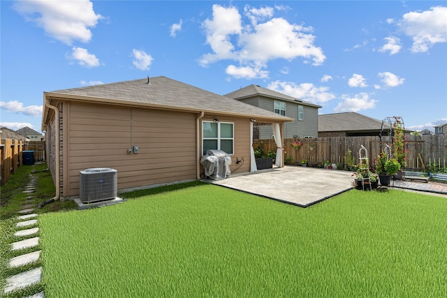 10731 Spring Brook Pass Dr, Humble, TX 77396 - back of house featuring a patio, a fenced backyard, and a shingled roof