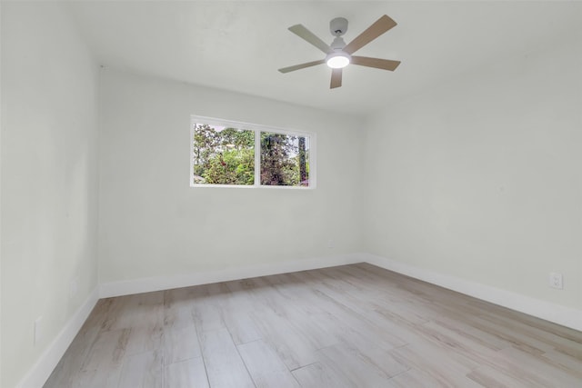 1602 Pine Oak Dr, Conroe, TX 77304 - spare room with a ceiling fan and wood finished floors