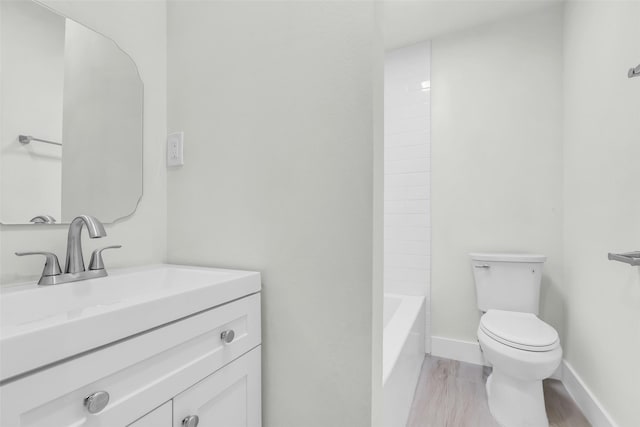 1602 Pine Oak Dr, Conroe, TX 77304 - bathroom with vanity and wood finished floors
