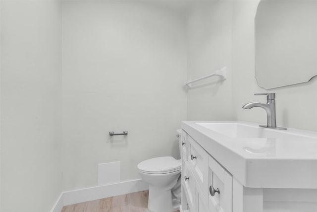 1602 Pine Oak Dr, Conroe, TX 77304 - bathroom featuring vanity and wood finished floors