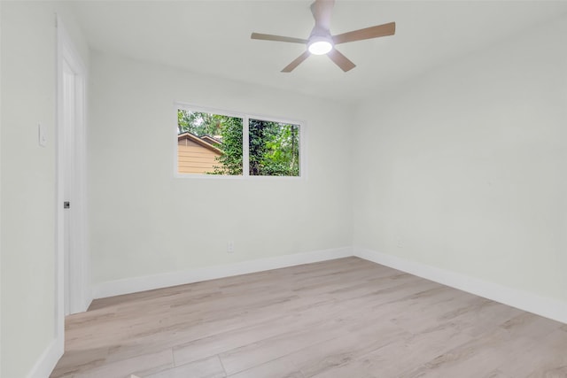1602 Pine Oak Dr, Conroe, TX 77304 - spare room with a ceiling fan and wood finished floors