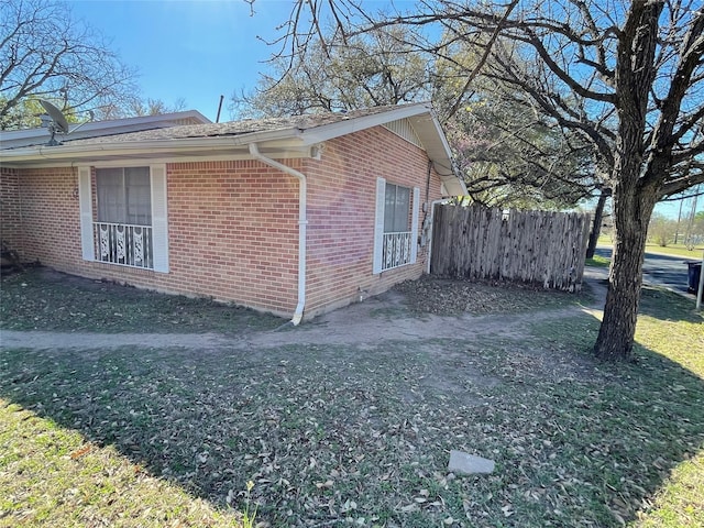 1901 Greenbrook Pkwy, Austin, TX 78723 - view of side of home featuring brick siding