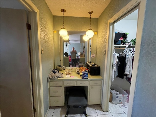 1901 Greenbrook Pkwy, Austin, TX 78723 - bathroom with a textured wall, tile patterned flooring, and a textured ceiling