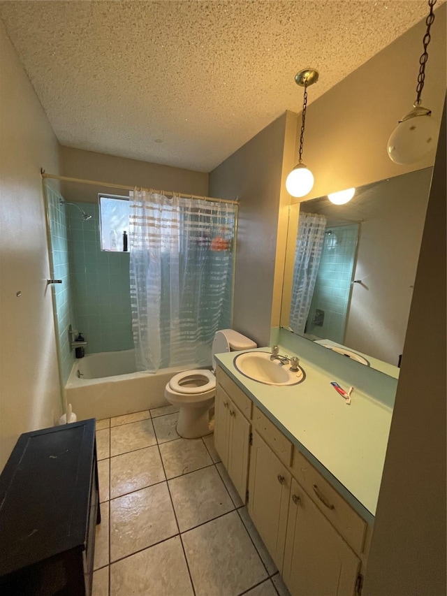 1901 Greenbrook Pkwy, Austin, TX 78723 - full bath with shower / tub combo with curtain, vanity, a textured ceiling, and tile patterned flooring